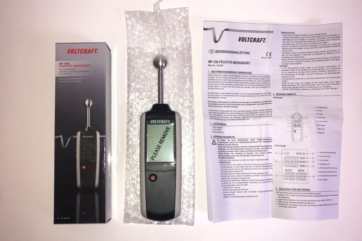 Das VOLTCRAFT MF-100 mit Verpackung, Anleitung und drei AAA-Batterien im Test